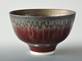 Red and bronze bowl 14.5cm diameter.
